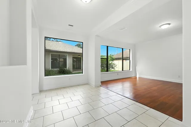 a view of a room with a hallway