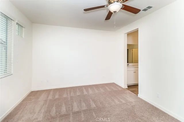 a bathroom with a double vanity sink and mirror