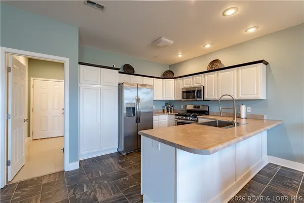 $320,000 | 27 Westminster Place, Sunrise Beach, MO 65079