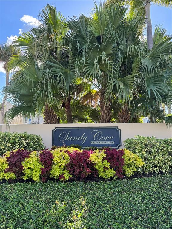 620 Orange Drive, Unit 225 Altamonte Springs, FL 32701 - Photo 12 of 25 a view of a sign board with flower garden