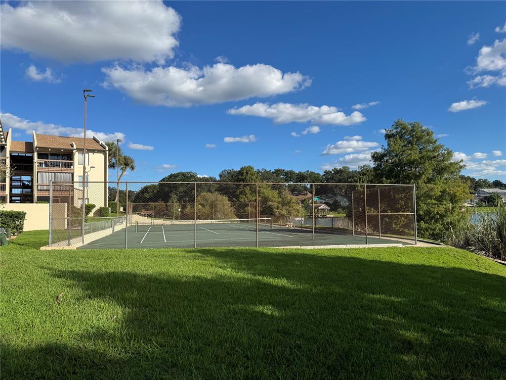 620 Orange Drive, Unit 225 Altamonte Springs, FL 32701 - Photo 13 of 25 a view of building with outdoor space