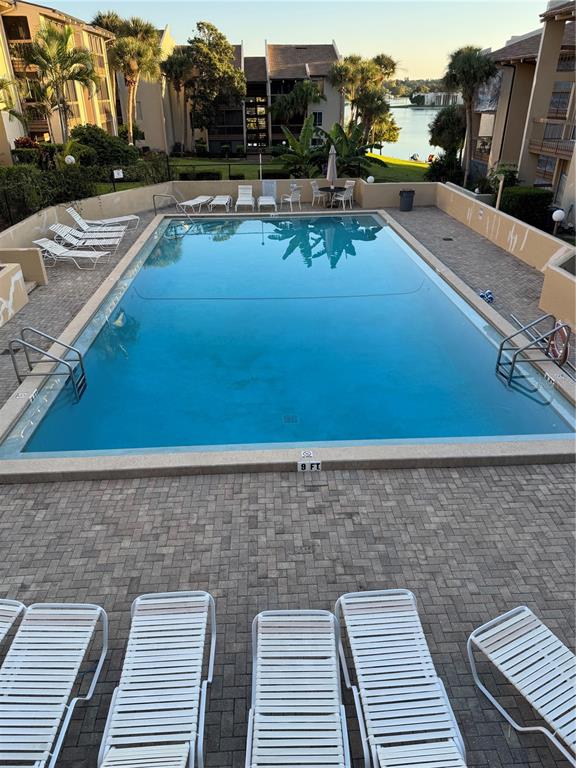 620 Orange Drive, Unit 225 Altamonte Springs, FL 32701 - Photo 15 of 25 swimming pool view with a outdoor seating