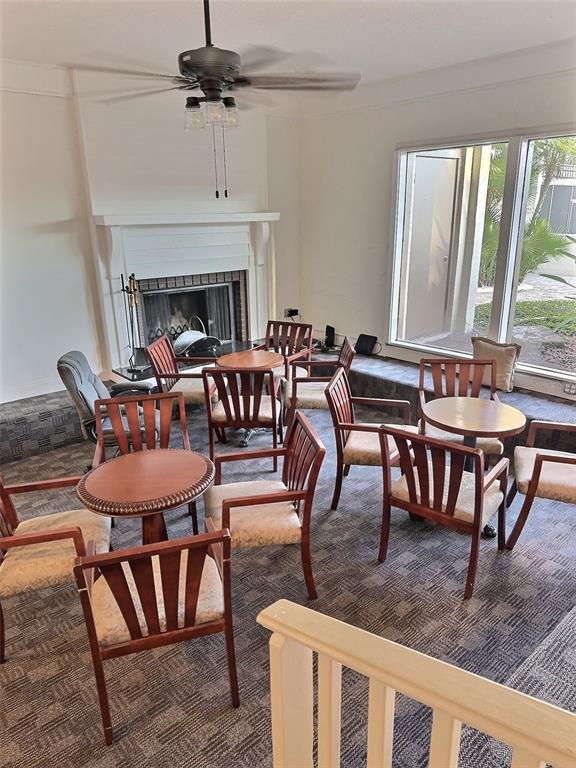 620 Orange Drive, Unit 225 Altamonte Springs, FL 32701 - Photo 21 of 25 a view of a dining room with furniture window and outside view