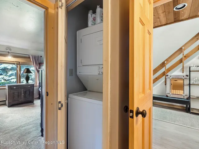 a view of closet and utility room