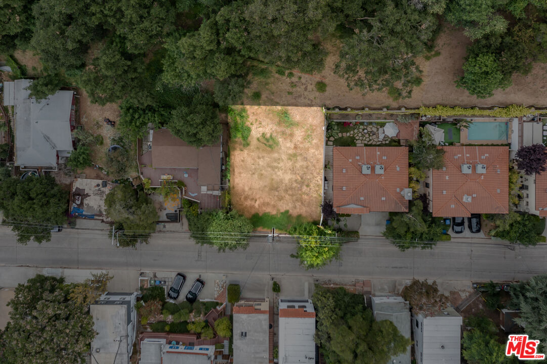 8536 Lookout Mountain Avenue Los Angeles, CA 90046 - Photo 5 of 7 an aerial view of a house with a yard