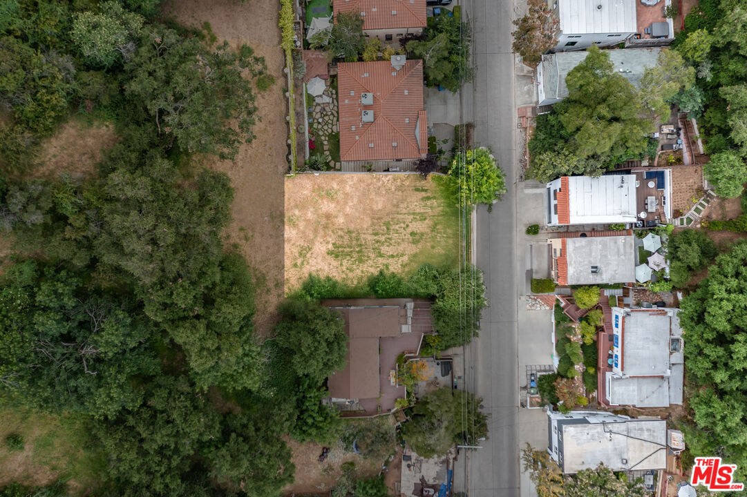 8536 Lookout Mountain Avenue Los Angeles, CA 90046 - Photo 6 of 7 an aerial view of a house with outdoor space and street view