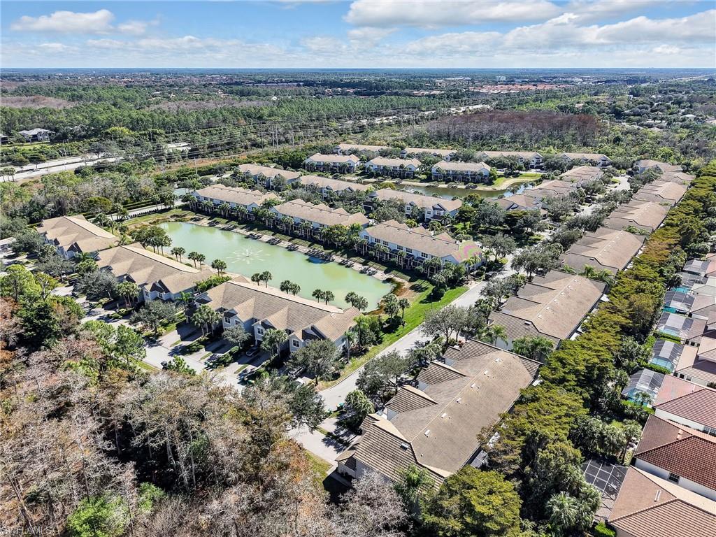 15918 Marcello Circle, Unit 239 Naples, FL 34110 - Photo 29 of 34 an aerial view of multiple house