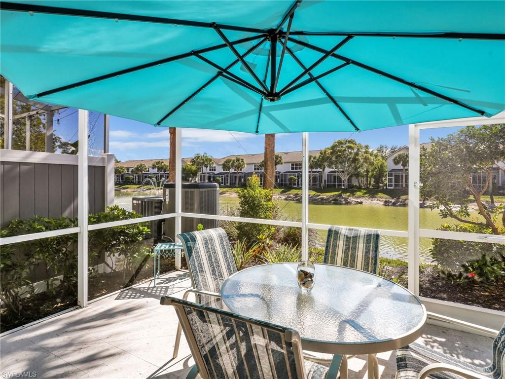 15918 Marcello Circle, Unit 239 Naples, FL 34110 - Photo 10 of 34 a balcony view with a seating space