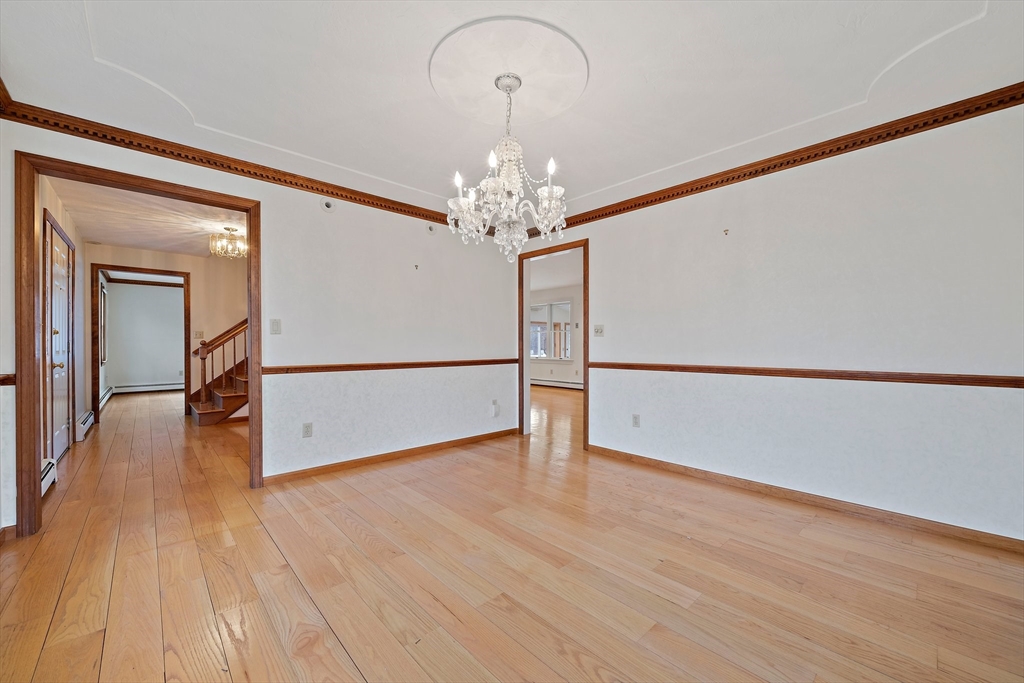 131 Setterland Farm Road Hanover, MA 02339 - Photo 10 of 32 a view of a livingroom with wooden floor