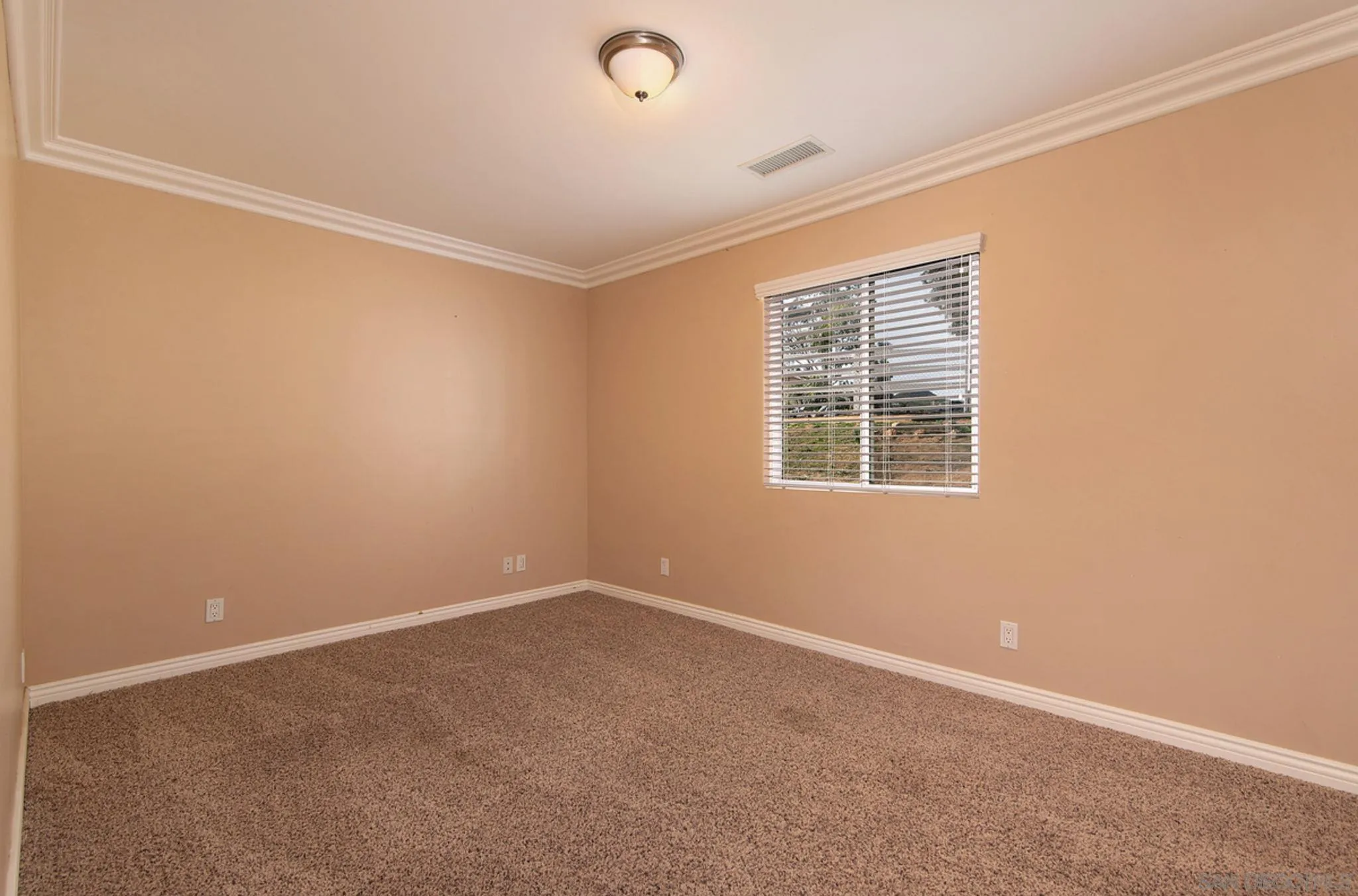 12764 Cumbres Road Valley Center, CA 92082 - Photo 13 of 22 an empty room with windows