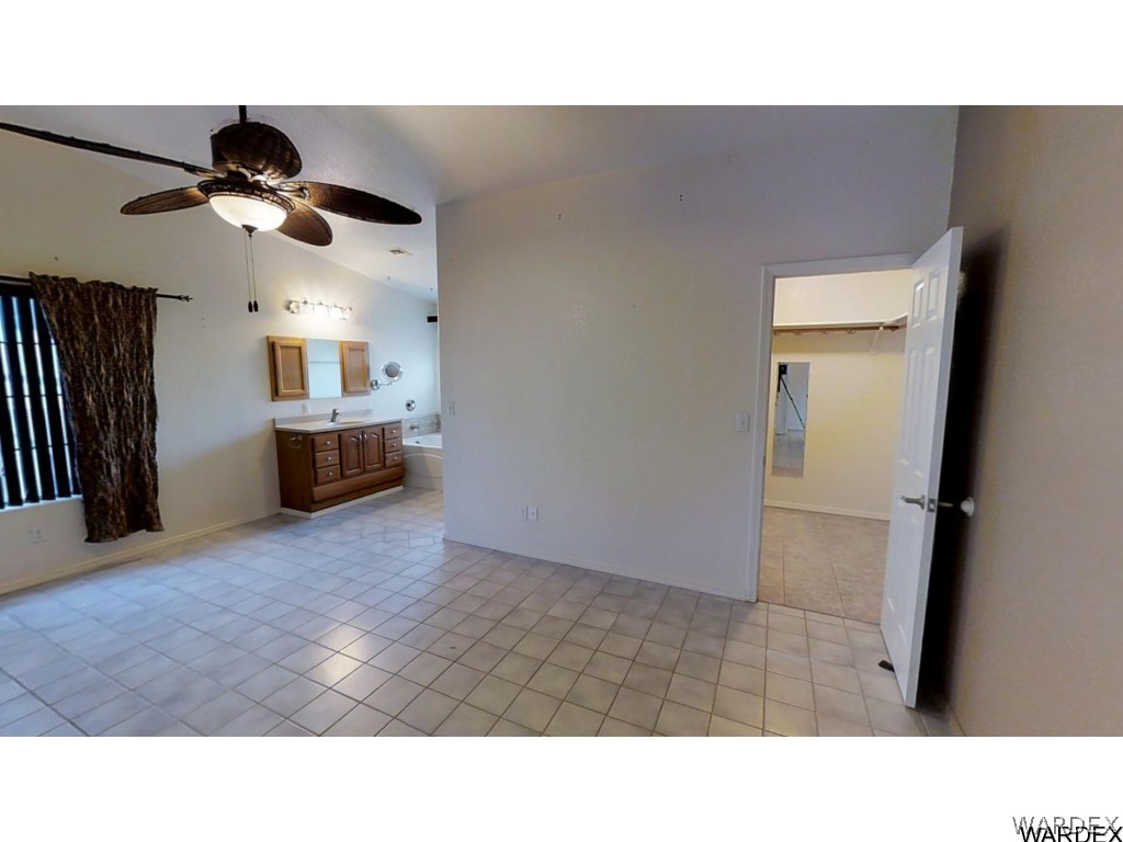 5850 Tableau Road Fort Mohave, AZ 86426 - Photo 13 of 20 a bathroom with a sink and a mirror