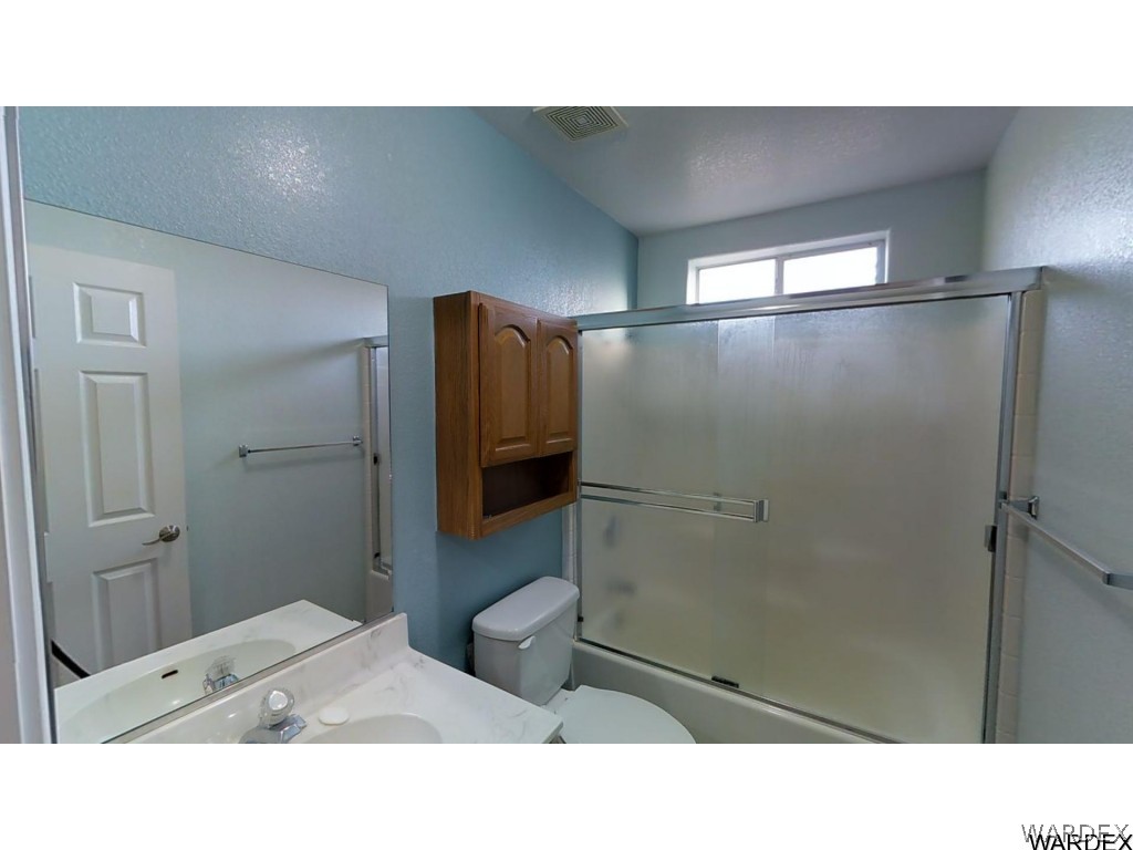 5850 Tableau Road Fort Mohave, AZ 86426 - Photo 17 of 20 a bathroom with a sink and shower