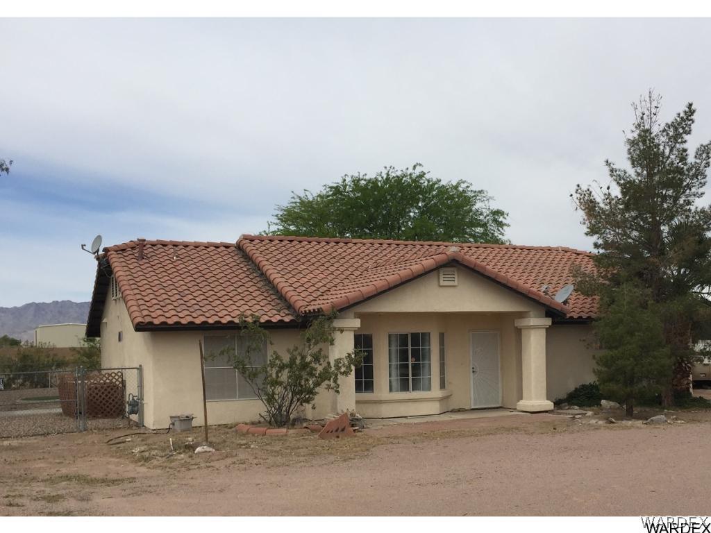 5850 Tableau Road Fort Mohave, AZ 86426 - Photo 20 of 20 a front view of a house with a yard and garage