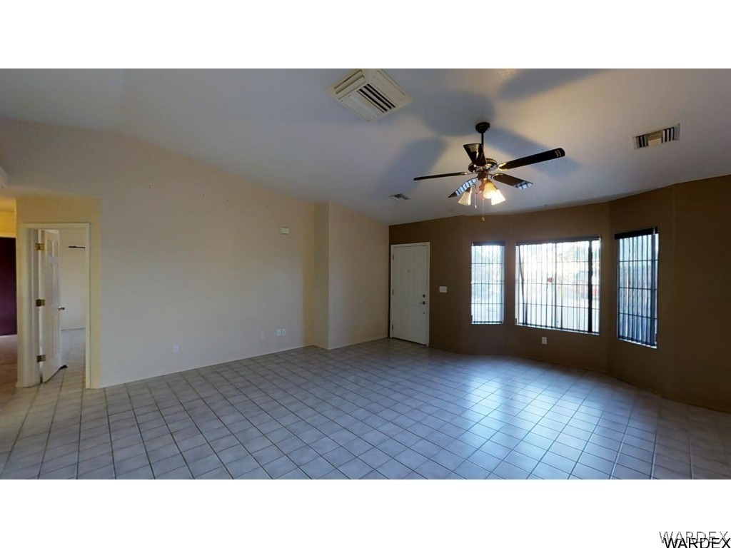 5850 Tableau Road Fort Mohave, AZ 86426 - Photo 4 of 20 a open hall with a ceiling fan and window