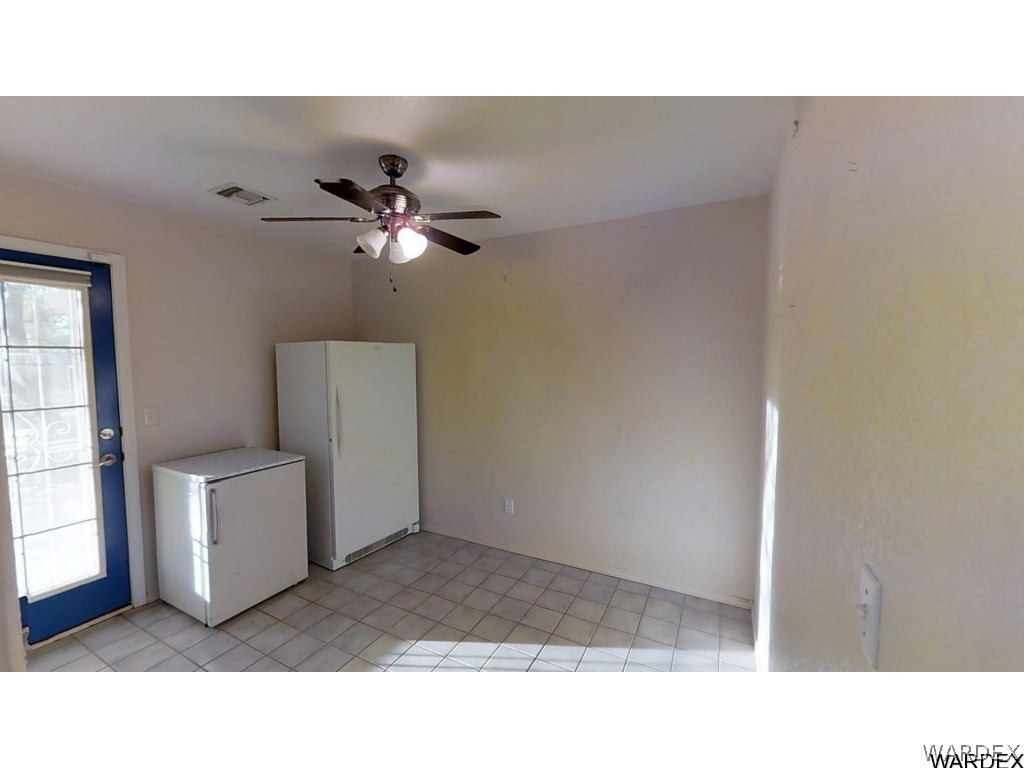 5850 Tableau Road Fort Mohave, AZ 86426 - Photo 10 of 20 a living room with furniture and a ceiling fan