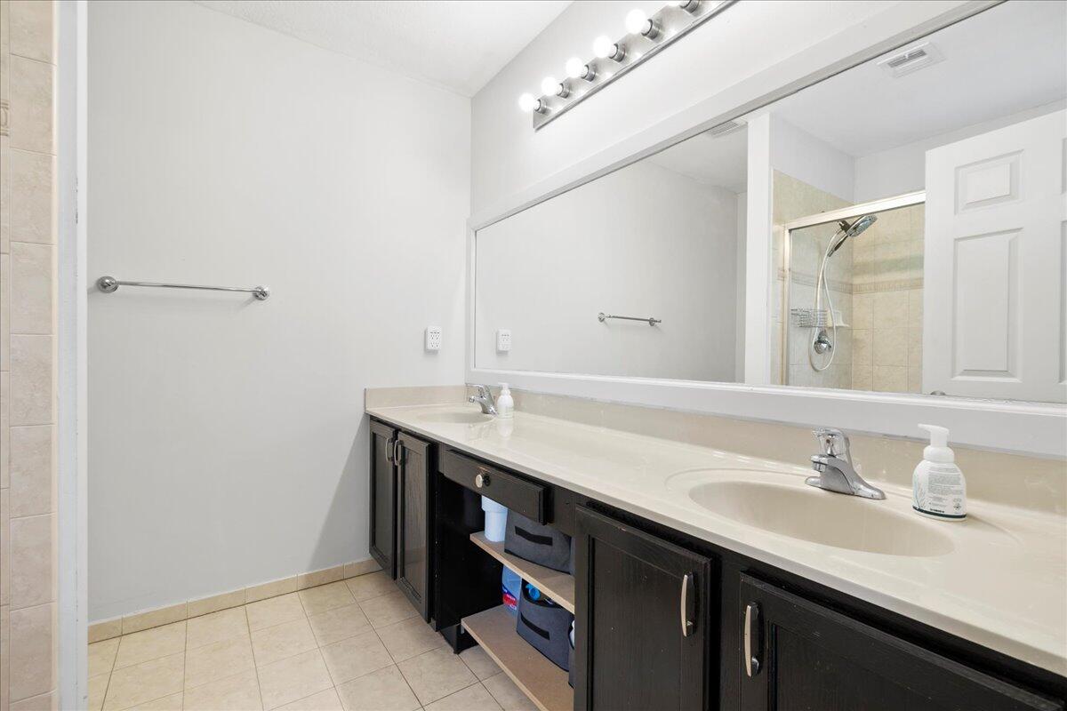 7120 Hawks Nest Terrace Riviera Beach, FL 33407 - Photo 16 of 39 Primary Bath