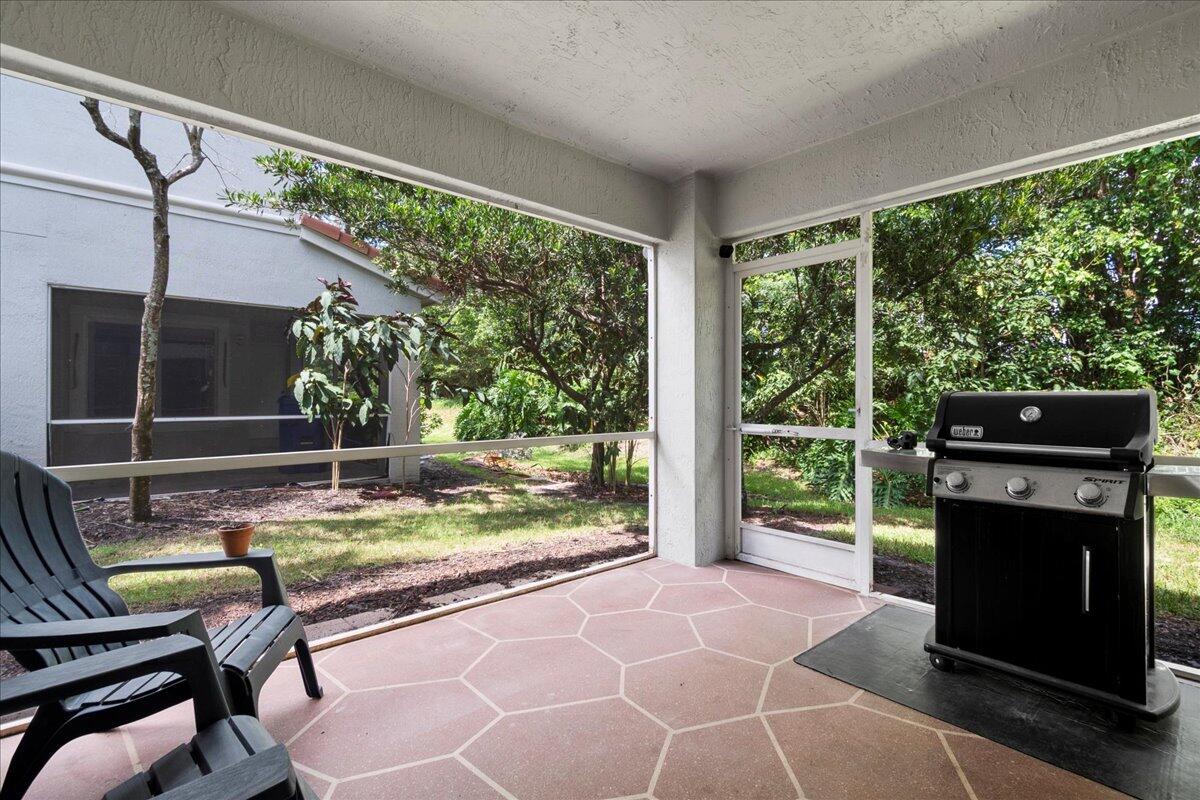 7120 Hawks Nest Terrace Riviera Beach, FL 33407 - Photo 7 of 39 Screen Covered Patio
