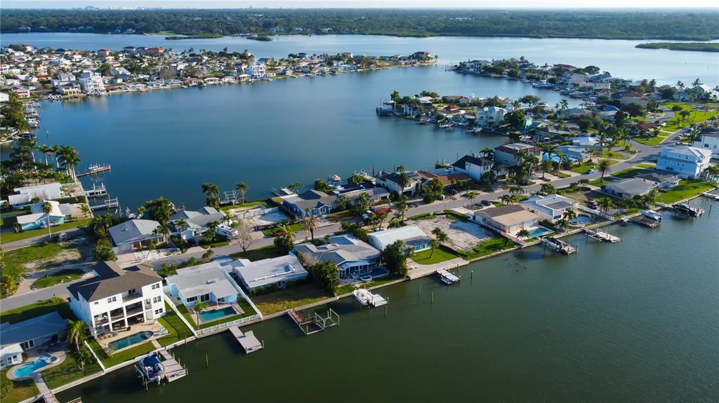 307 173rd Avenue North Redington Beach, FL 33708 - Photo 12 of 27 an aerial view of a house with a lake view