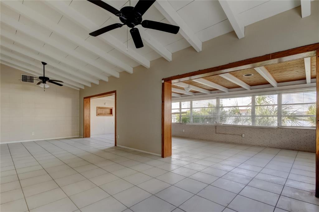 307 173rd Avenue North Redington Beach, FL 33708 - Photo 19 of 27 an empty room with windows