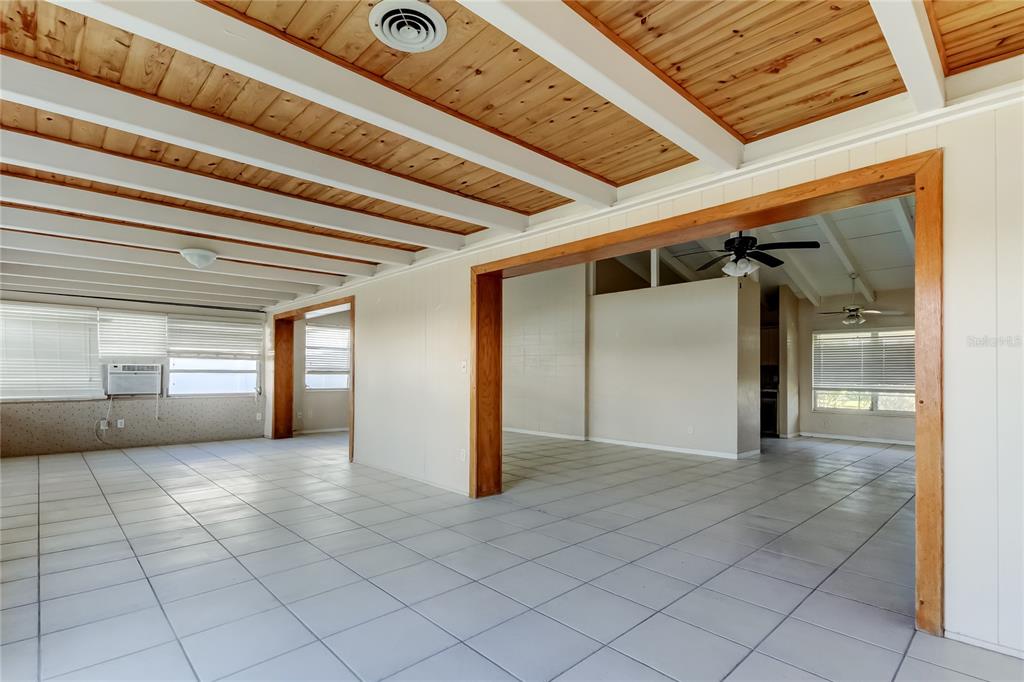307 173rd Avenue North Redington Beach, FL 33708 - Photo 21 of 27 a view of a hallway with wooden shelves