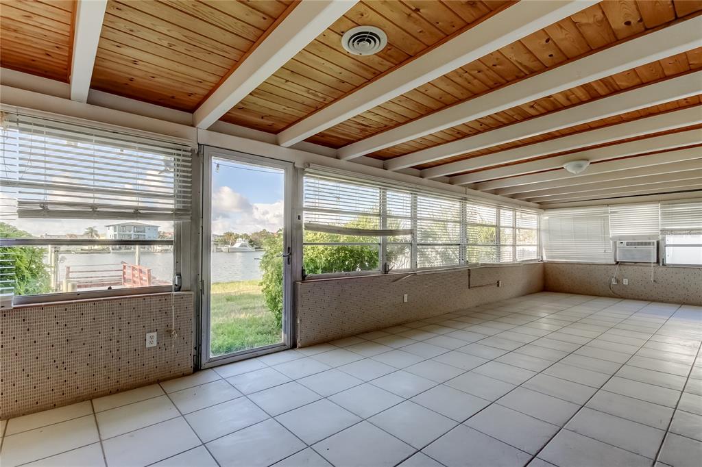 307 173rd Avenue North Redington Beach, FL 33708 - Photo 22 of 27 a view of an empty room with a window