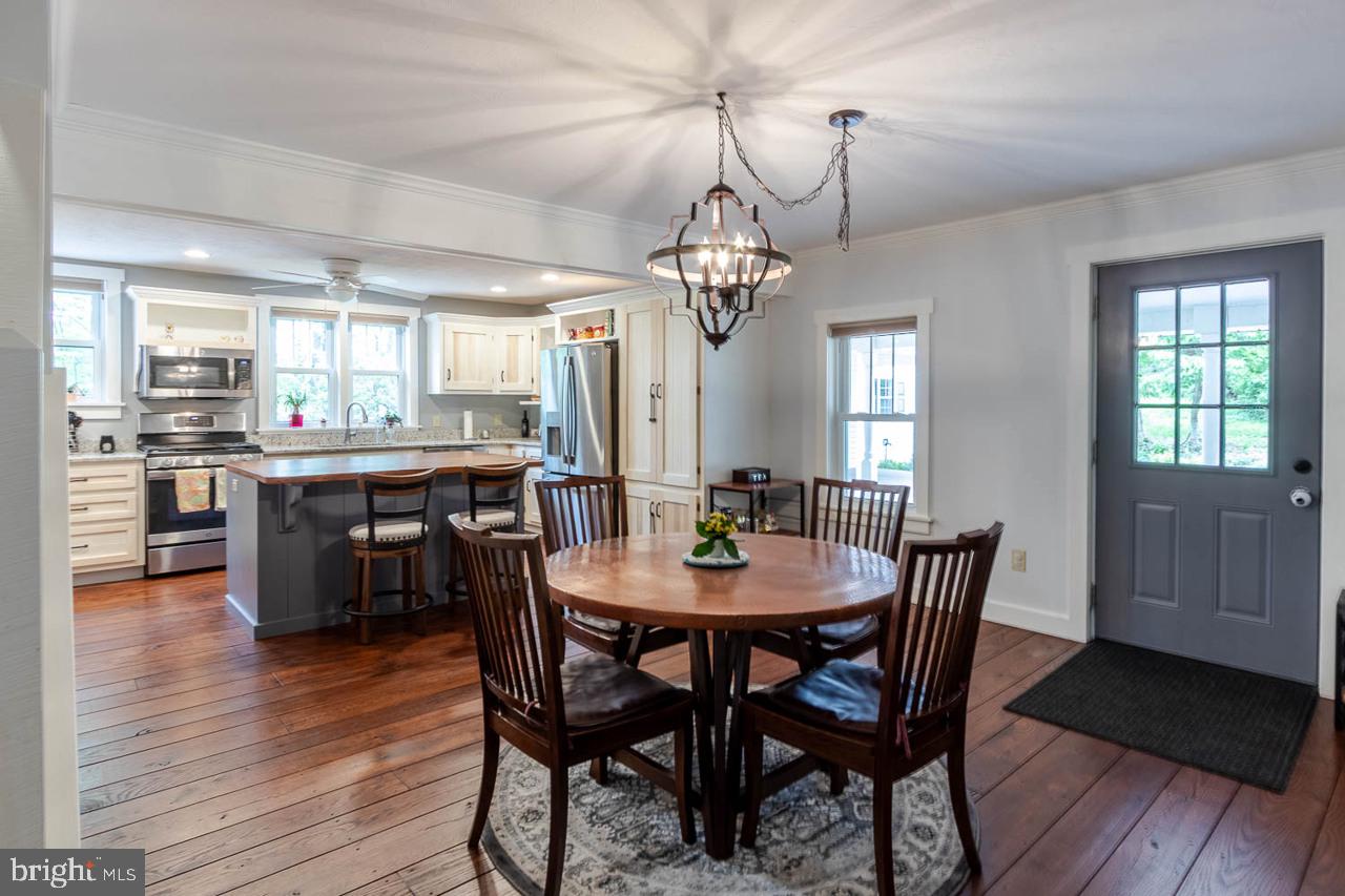 1834 Decker Hollow Road Tyrone, PA 16686 - Photo 14 of 40 a view of a dining room with furniture window and wooden floor