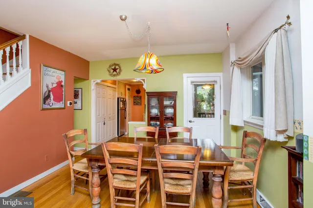a kitchen with stainless steel appliances a refrigerator sink and cabinets