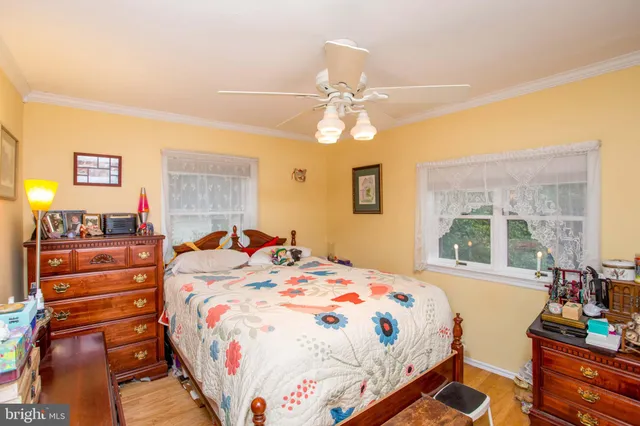 a bedroom with a bed and furniture