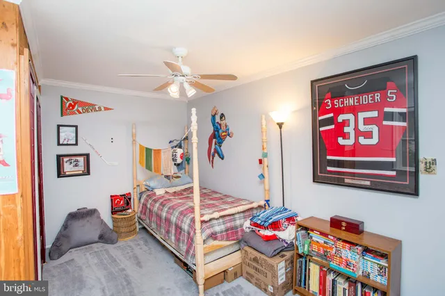 a bathroom with a double vanity sink a mirror and shower