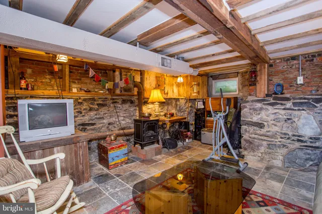a view of a chair and table in the balcony