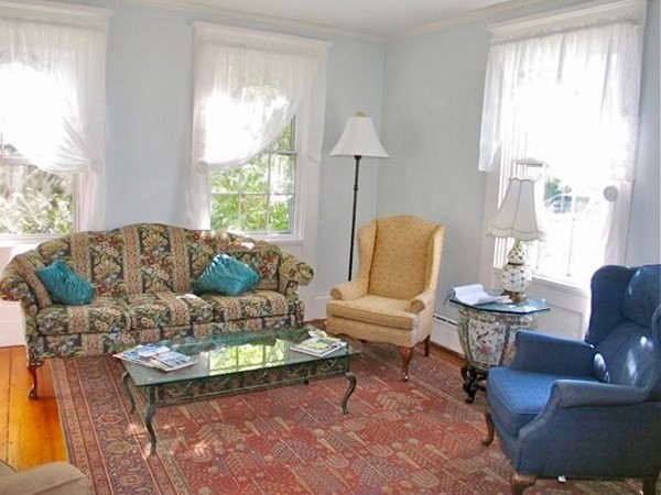 12 Cottle Lane Edgartown, MA 02539 - Photo 13 of 29 a living room with furniture and a large window