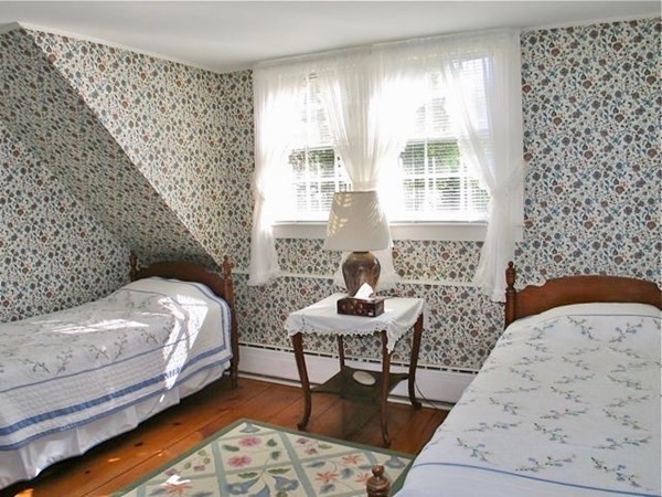 12 Cottle Lane Edgartown, MA 02539 - Photo 23 of 29 a bedroom with a bed and a window