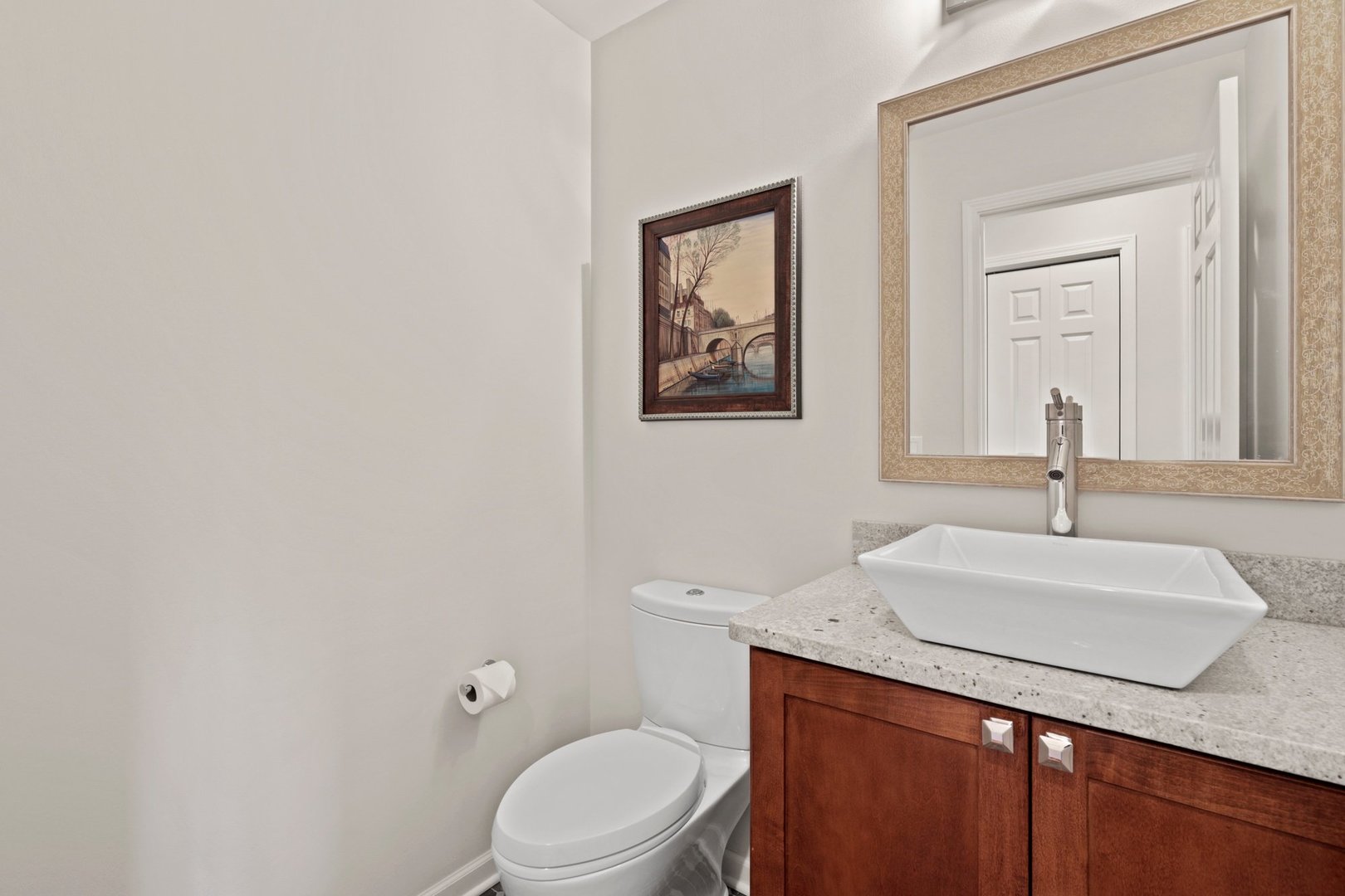 235 Covington Drive Barrington, IL 60010 - Photo 16 of 33 a bathroom with a sink a toilet and mirror