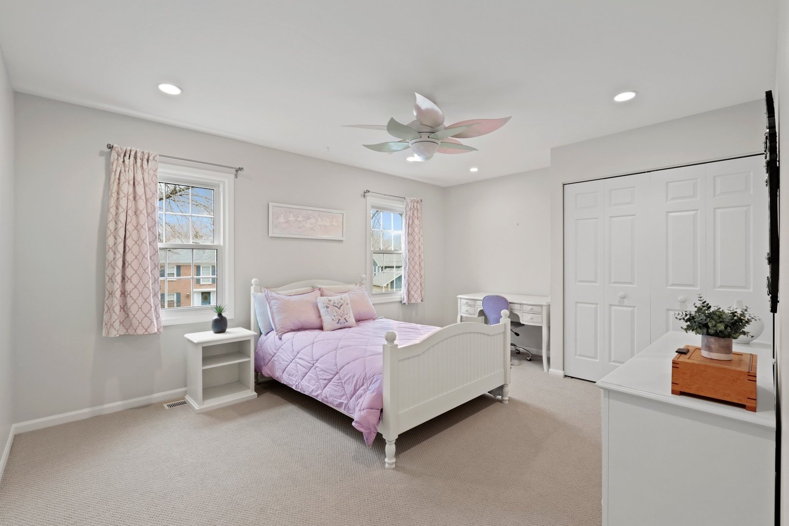 235 Covington Drive Barrington, IL 60010 - Photo 21 of 33 a spacious bedroom with a bed and a window