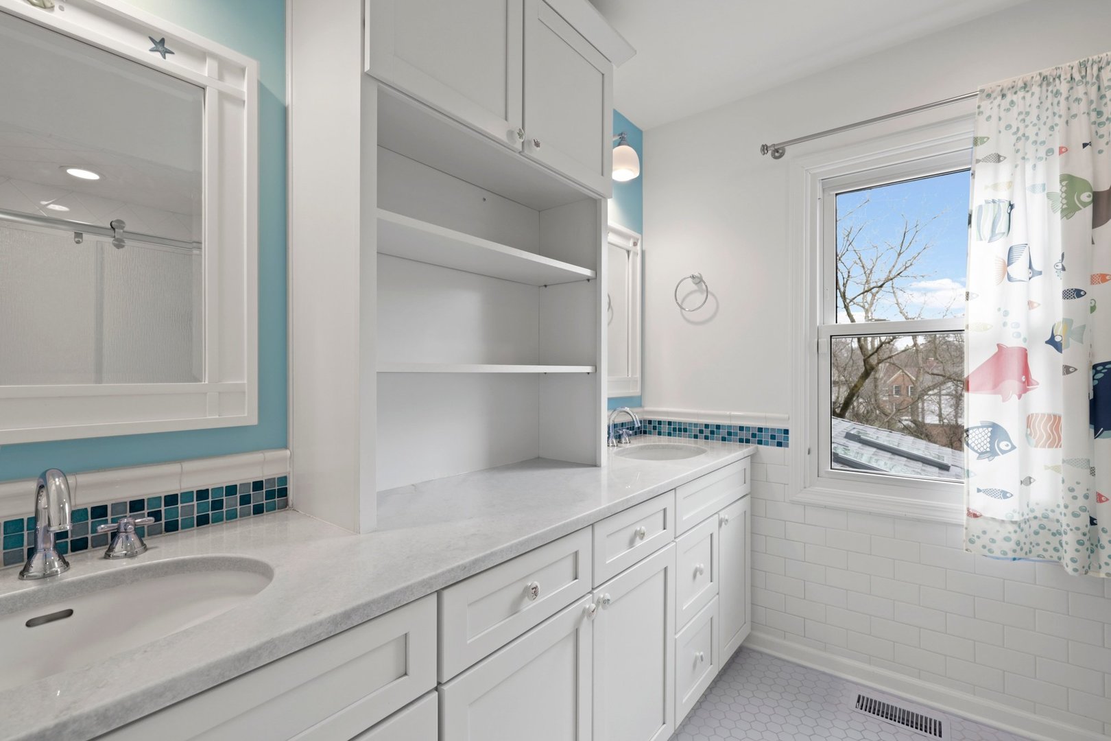 235 Covington Drive Barrington, IL 60010 - Photo 23 of 33 a spacious bathroom with a granite countertop sink and a mirror