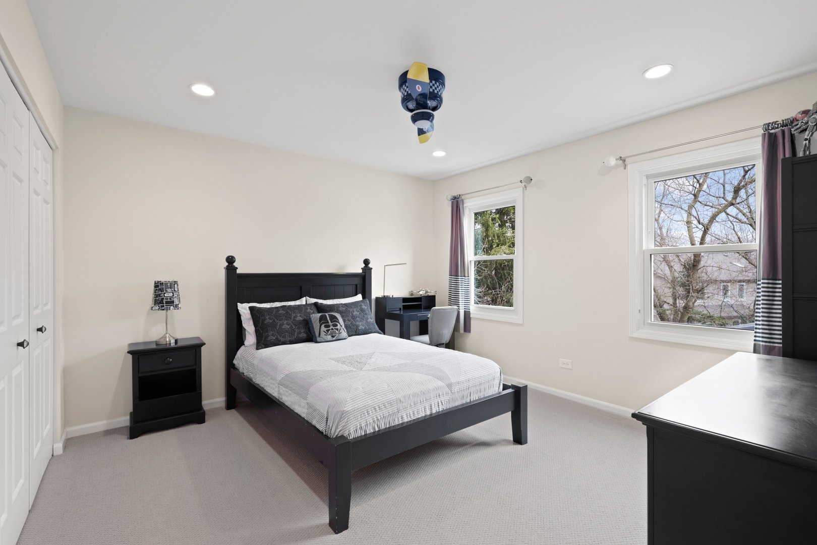 235 Covington Drive Barrington, IL 60010 - Photo 24 of 33 a bedroom with a bed wall painting and a window