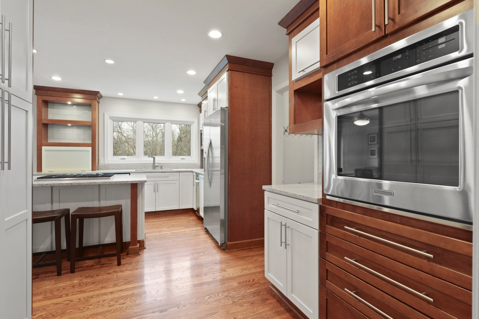 235 Covington Drive Barrington, IL 60010 - Photo 9 of 33 a kitchen with white cabinets and counter space