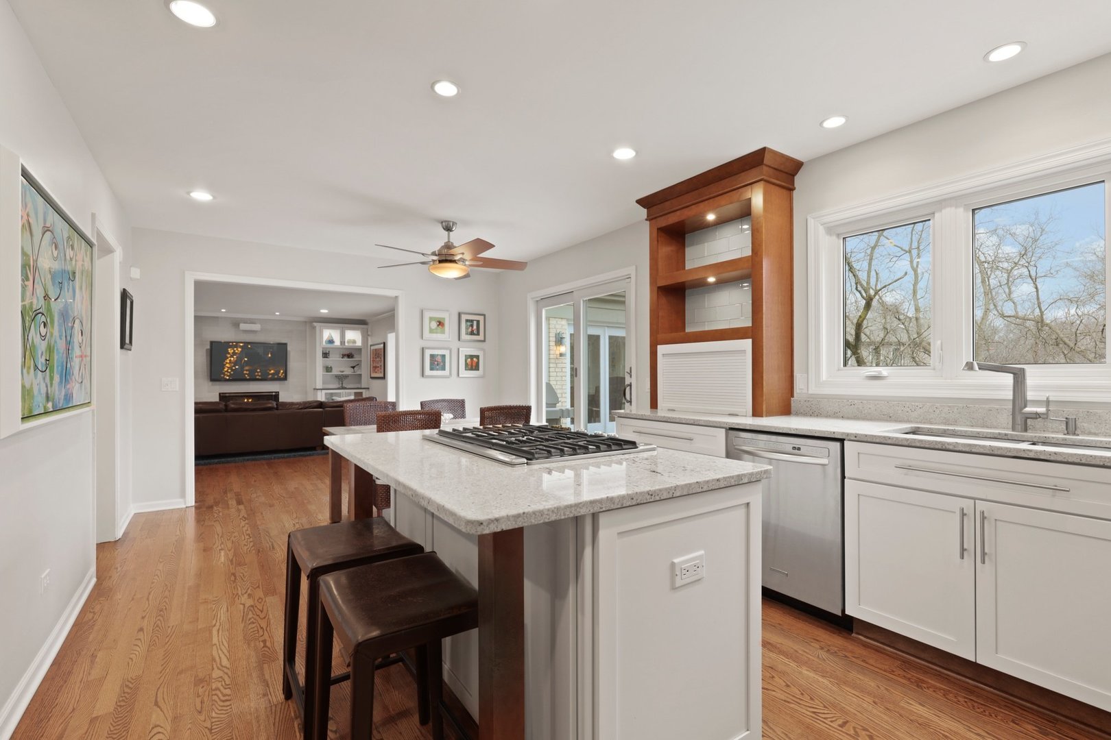 235 Covington Drive Barrington, IL 60010 - Photo 10 of 33 a kitchen with a stove a sink a dining table and chairs