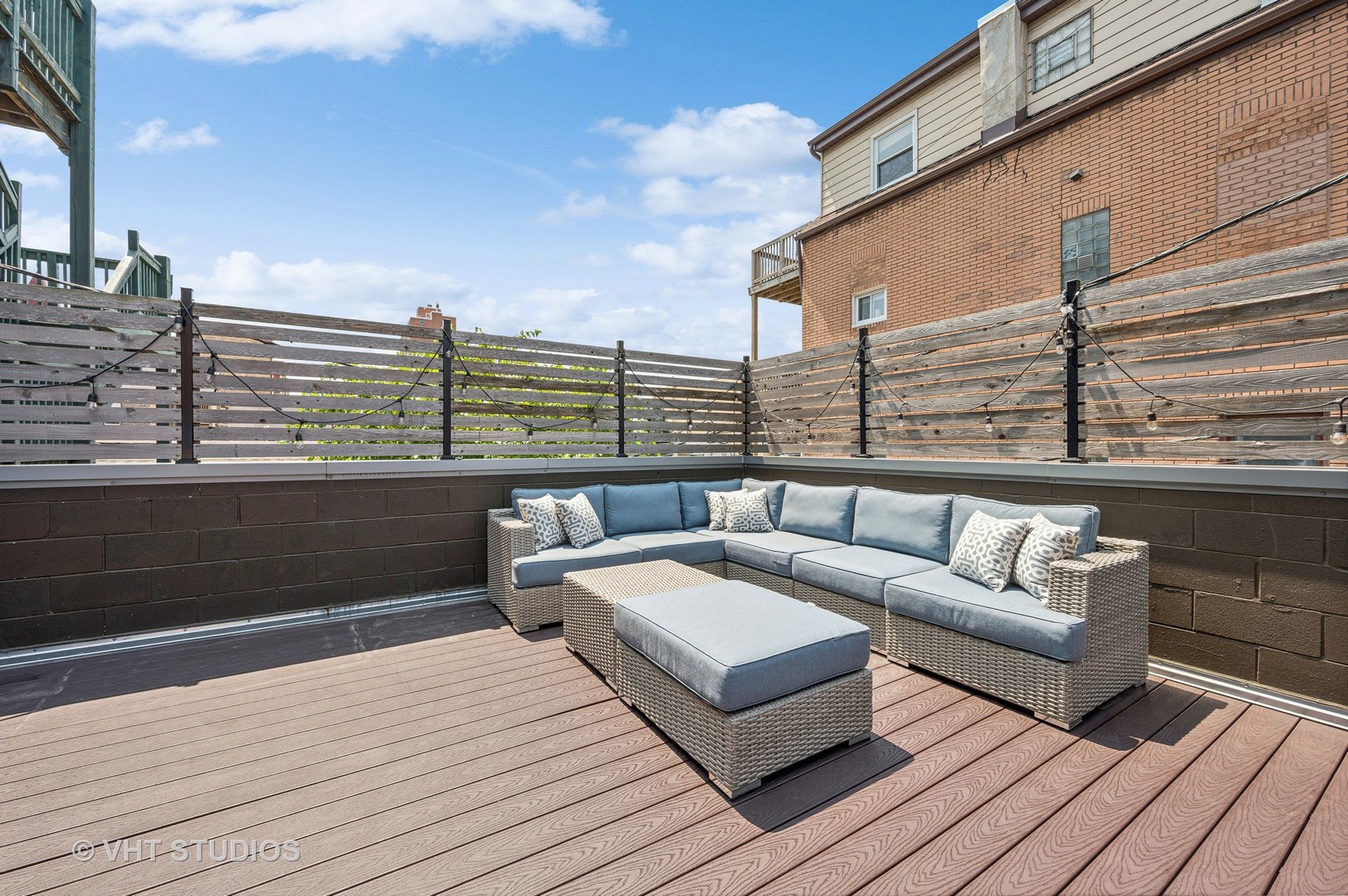 956 North Noble Street, Unit 1S Chicago, IL 60642 - Photo 28 of 31 a view of a roof deck with couches