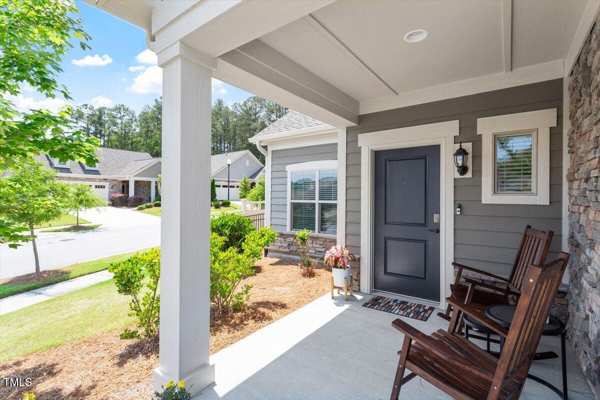 1357 Prevenient Drive Wake Forest, NC 27587 - Photo 9 of 58 a front view of a house with garden