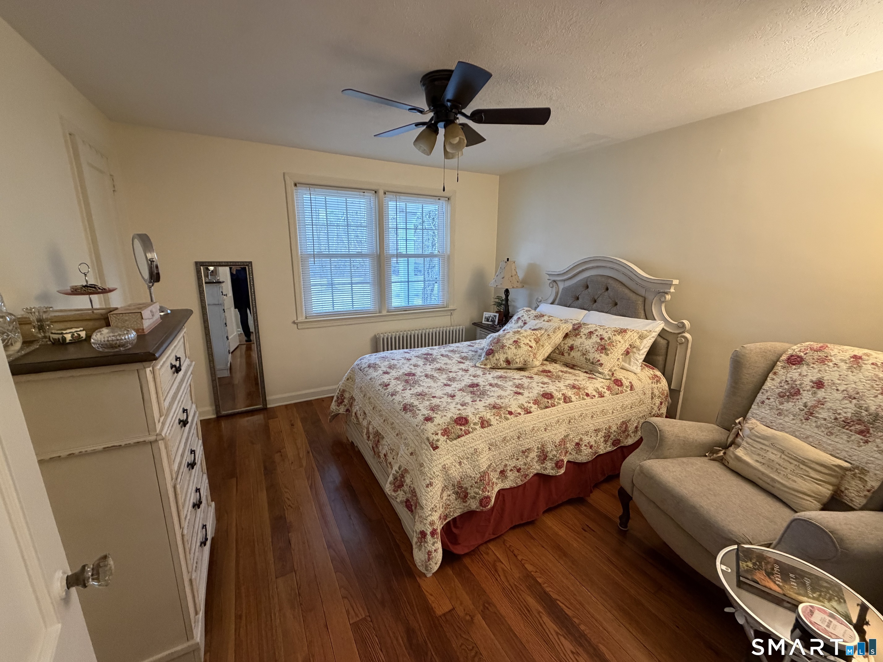 18 Bridge Street, Unit 2C Naugatuck, CT 06770 - Photo 11 of 23 a bedroom with a bed and a window