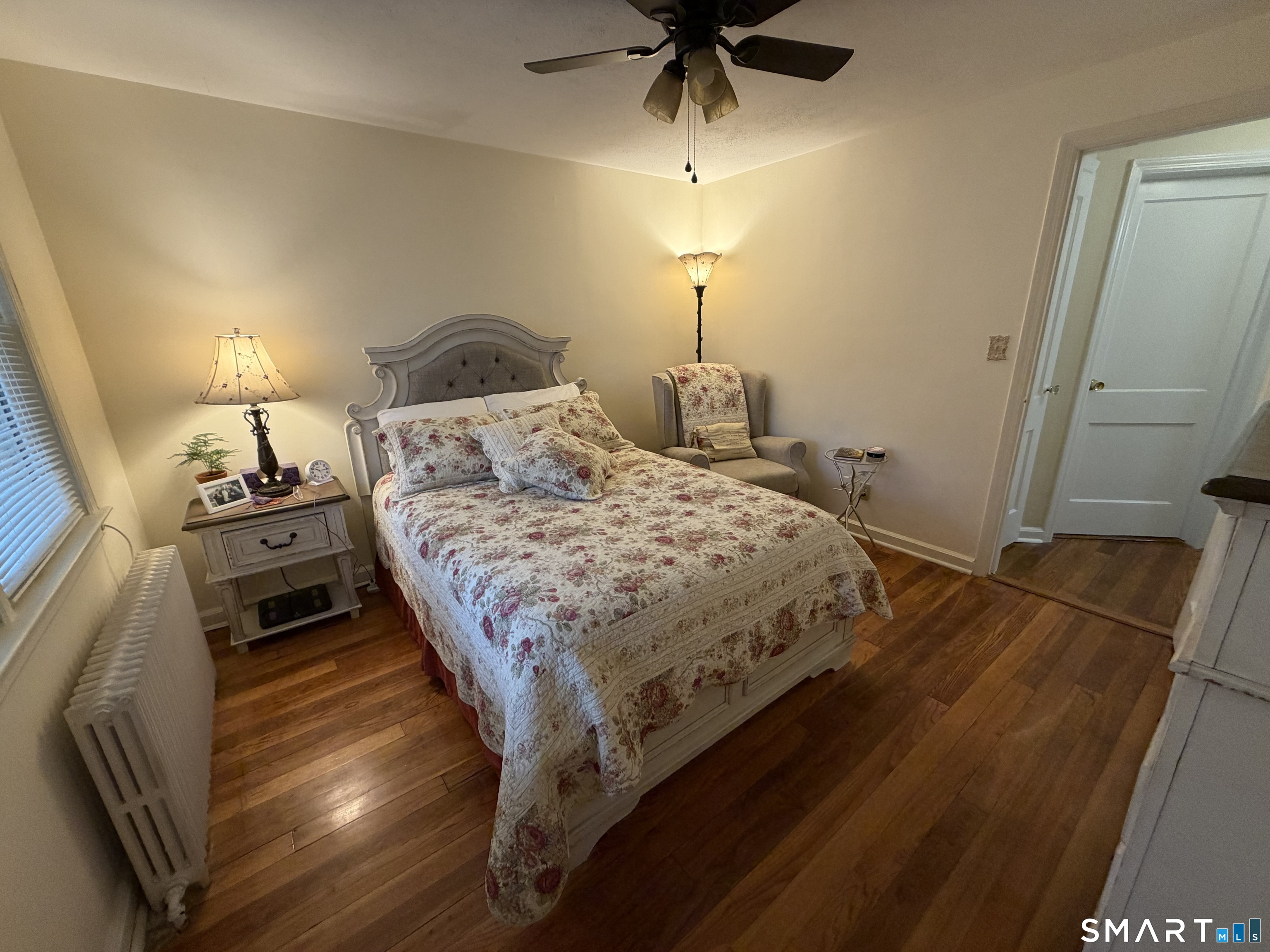 18 Bridge Street, Unit 2C Naugatuck, CT 06770 - Photo 12 of 23 a bedroom with a bed and a mirror