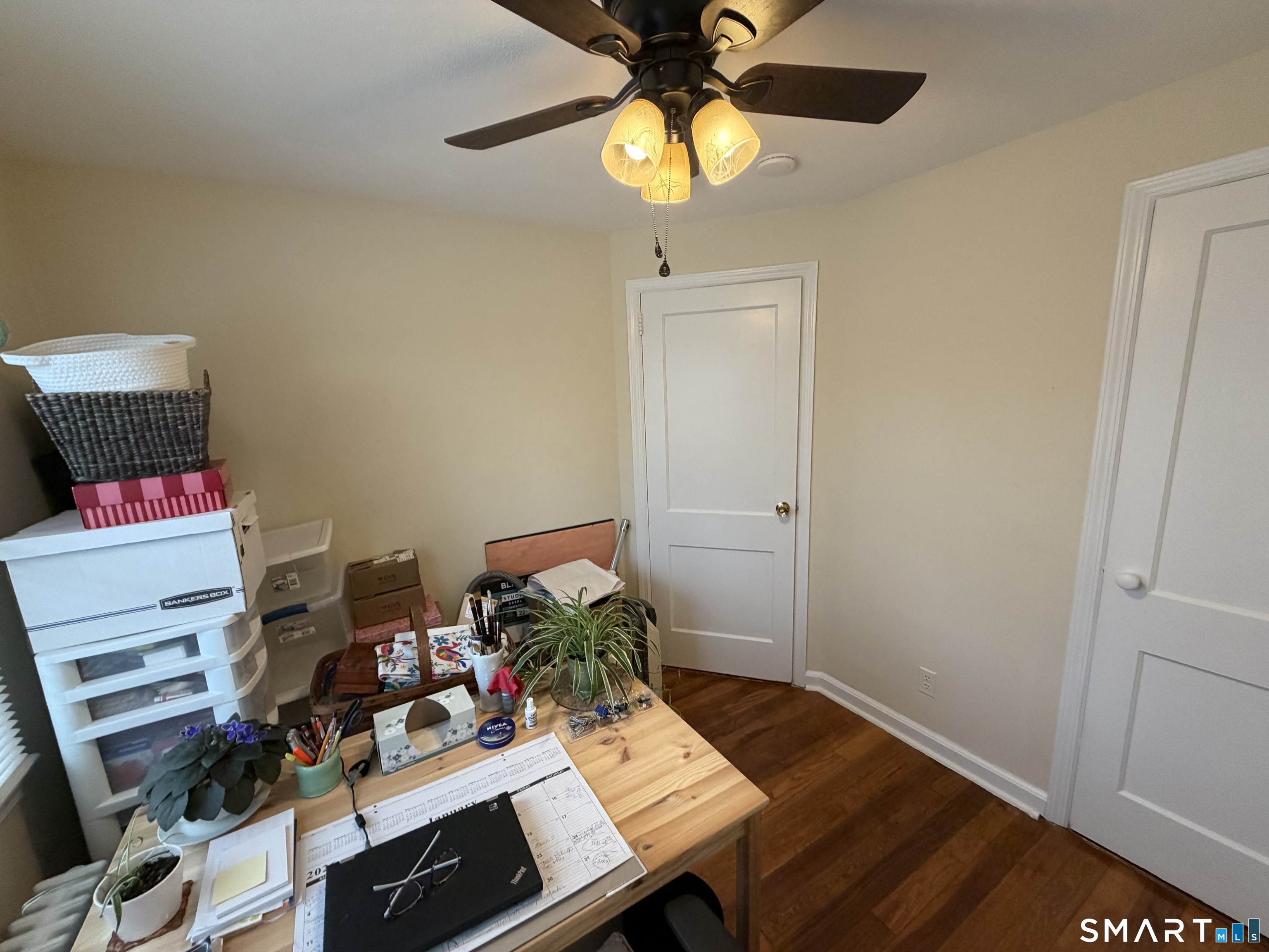 18 Bridge Street, Unit 2C Naugatuck, CT 06770 - Photo 15 of 23 a view of a workspace with furniture and a window