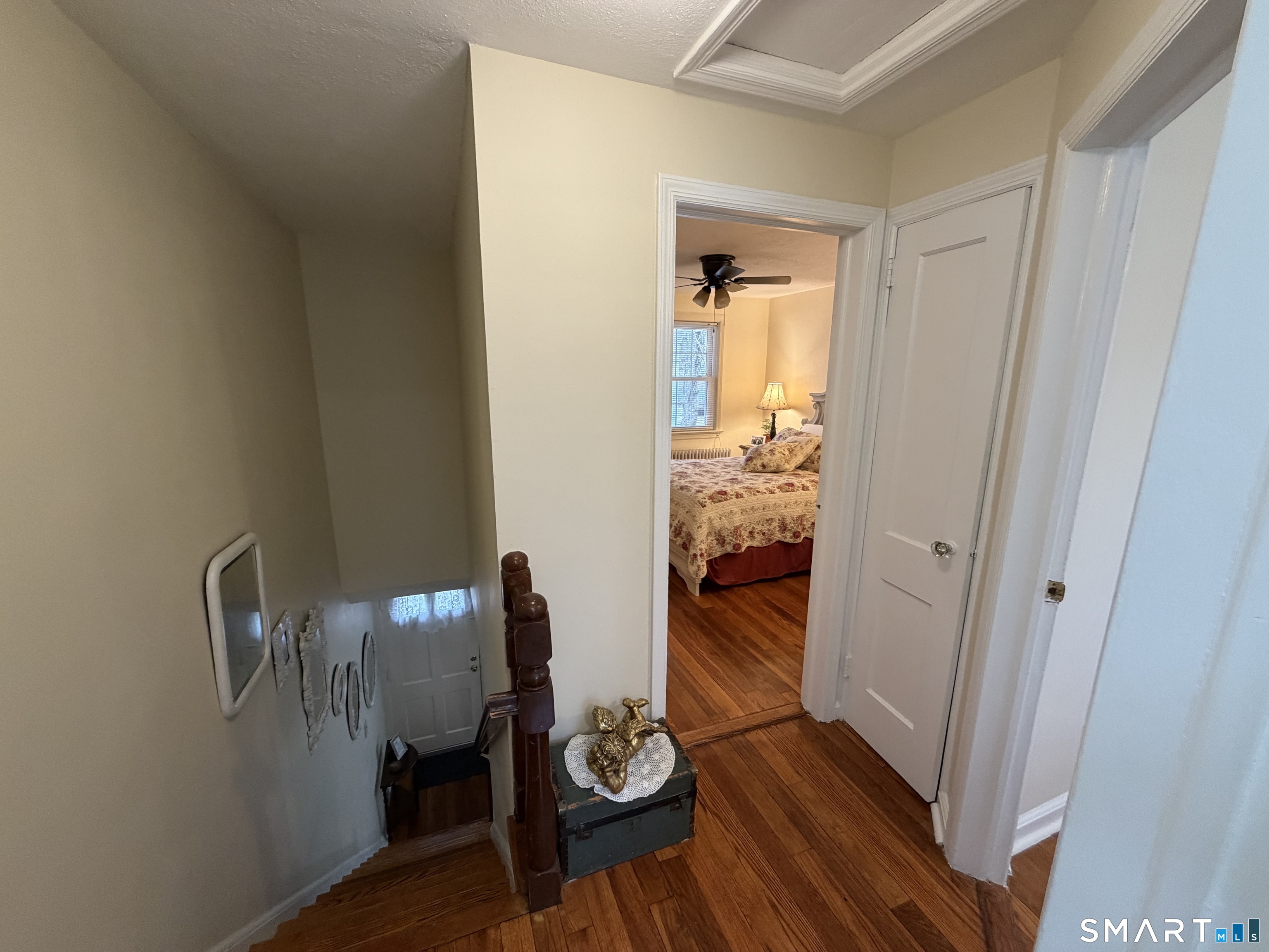 18 Bridge Street, Unit 2C Naugatuck, CT 06770 - Photo 17 of 23 a view of dining room and wooden floor