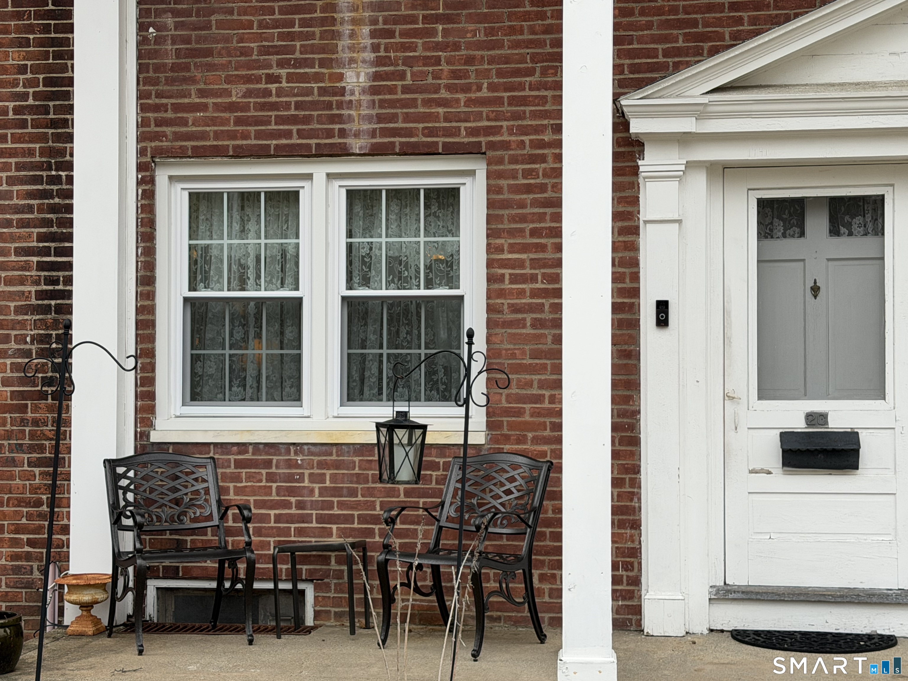 18 Bridge Street, Unit 2C Naugatuck, CT 06770 - Photo 20 of 23 a front view of a building with outdoor seating