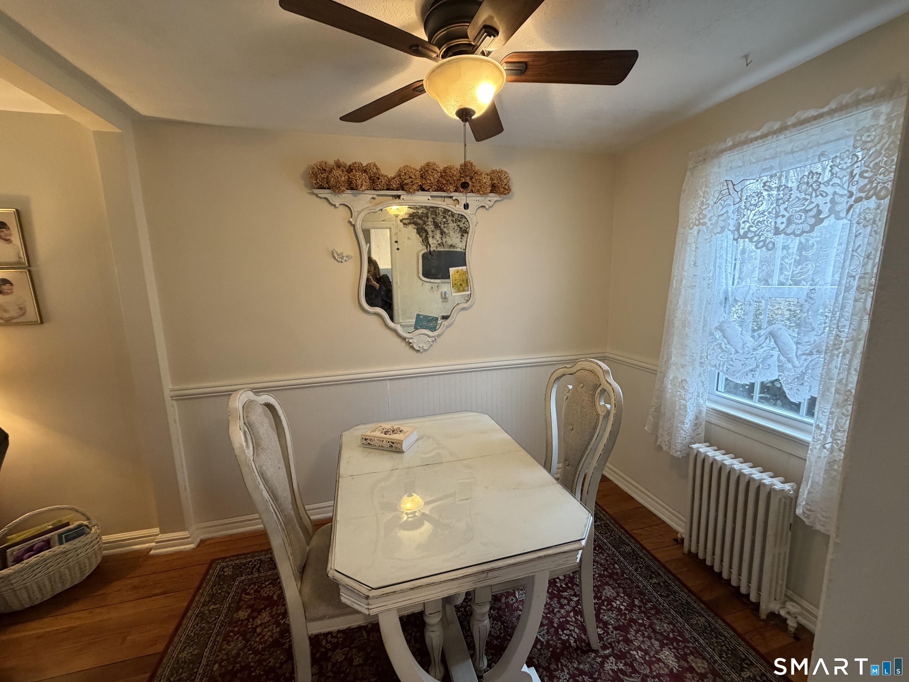 18 Bridge Street, Unit 2C Naugatuck, CT 06770 - Photo 9 of 23 a view of a dining room with furniture and chandelier