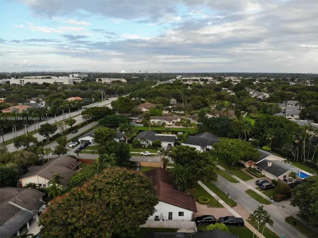 an aerial view of a city with lots of residential buildings