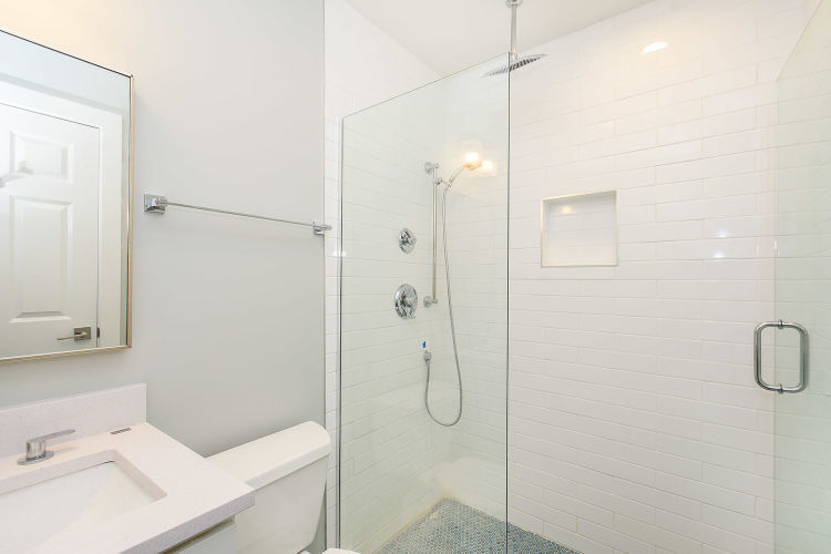 1915 West Irving Park Road, Unit 303 Chicago, IL 60613 - Photo 10 of 14 a bathroom with a shower and a sink