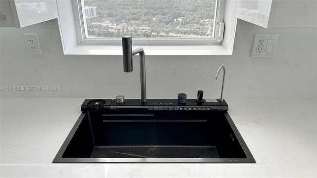 a close view of a stove top oven and cabinets