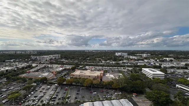 a room with gym equipment and large window